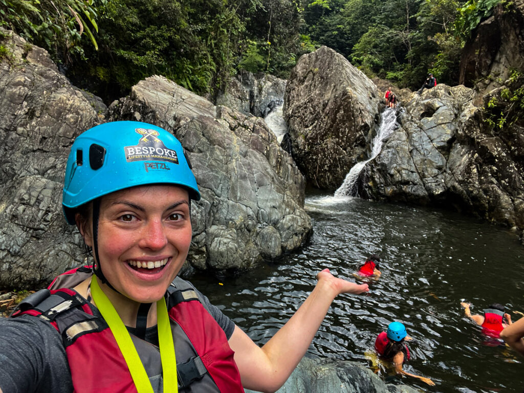 Kat showing the natural waterslide in El Yunque