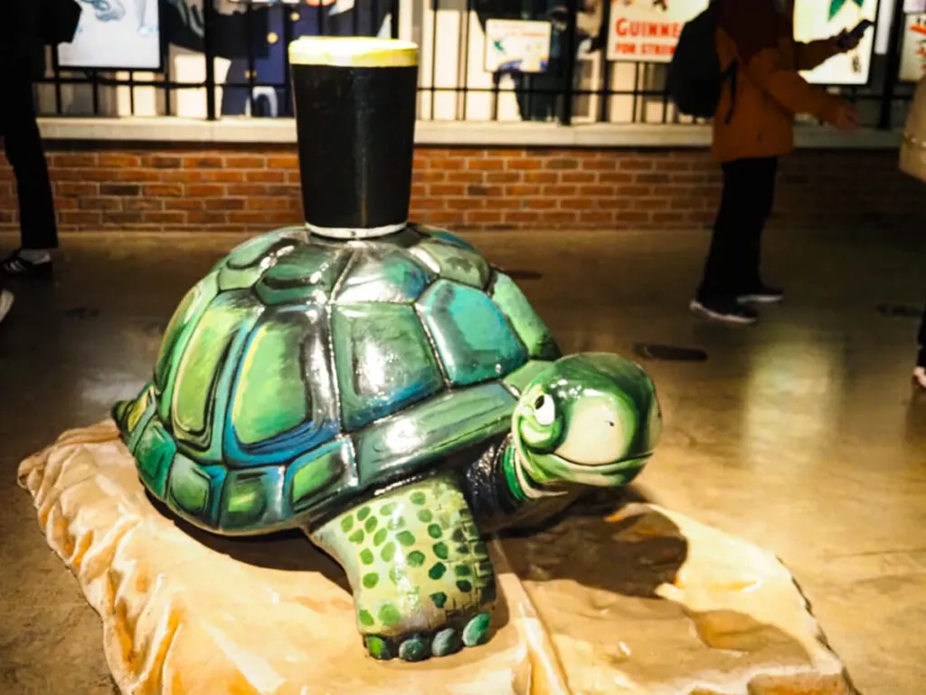 Turtle with a Guinness on his back statue