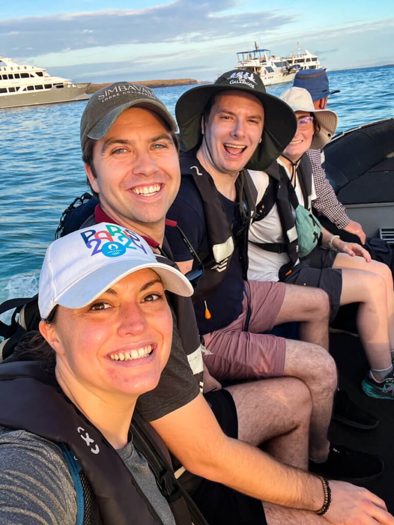 Kat, Chris, Dave, and Jordan on the boat going to our Galapagos cruise
