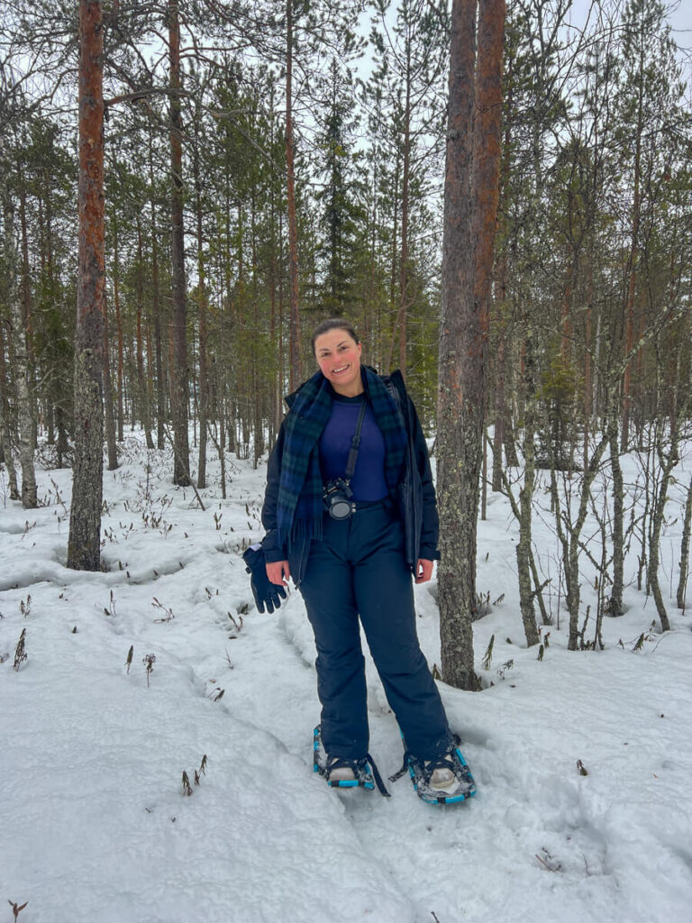 Kat snowshoeing in the Finnish Lapland forest