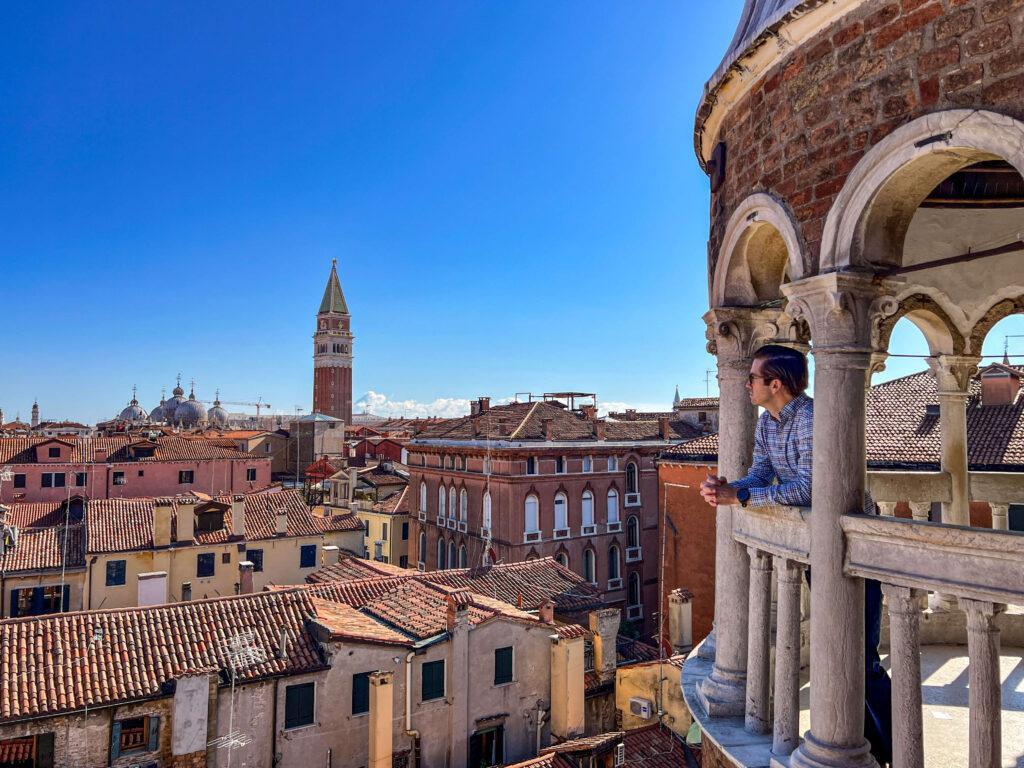 Chris looking out at Scala Contarini del Bovolo