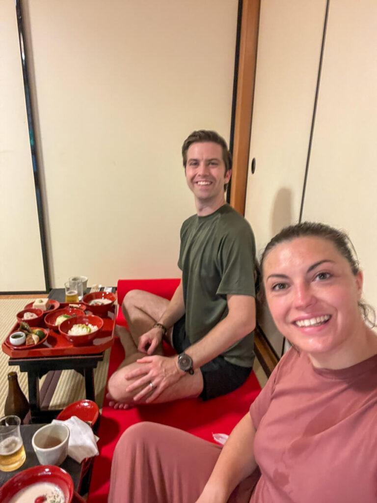 Kat and Chris sitting on the floor at Shigetsu for lunch