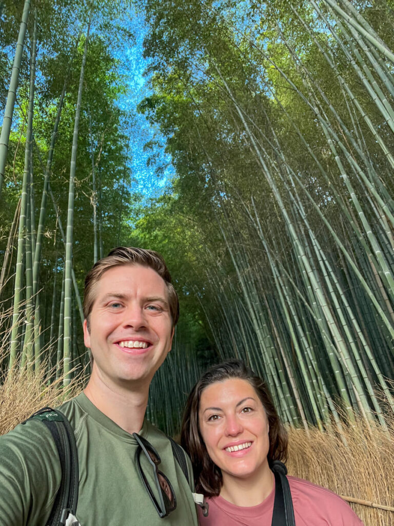Kat and Chris smiling at the Arashiyama Bamboo Forest