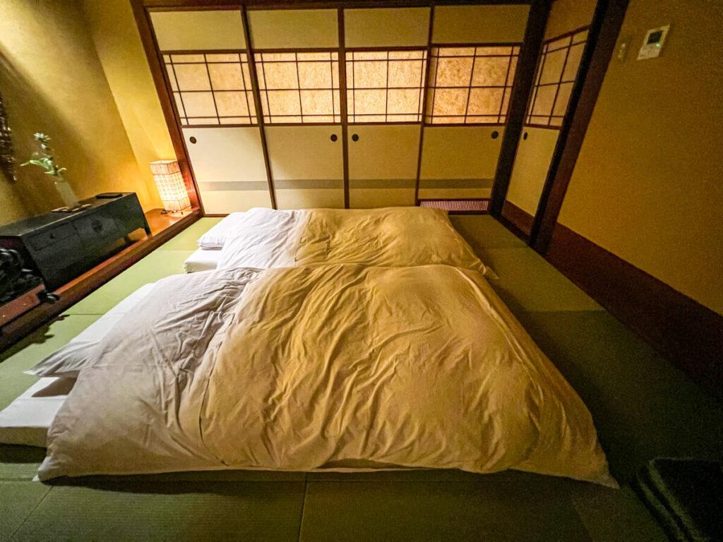 Our traditional room with tatami mats and futon mattresses at a ryokan in Hakone